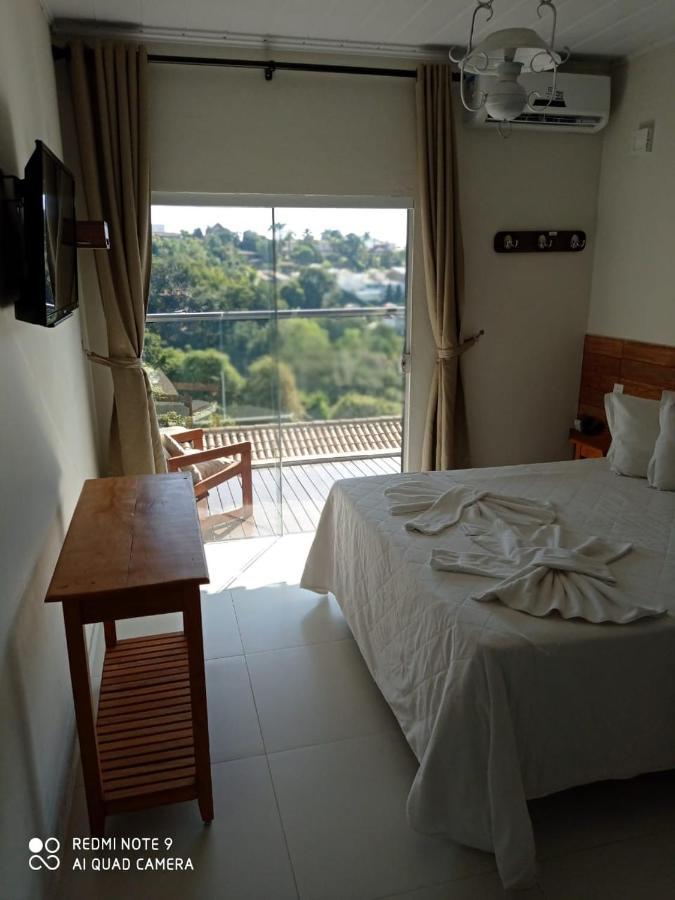 Hotel Escarpas Do Lago Capitólio Buitenkant foto